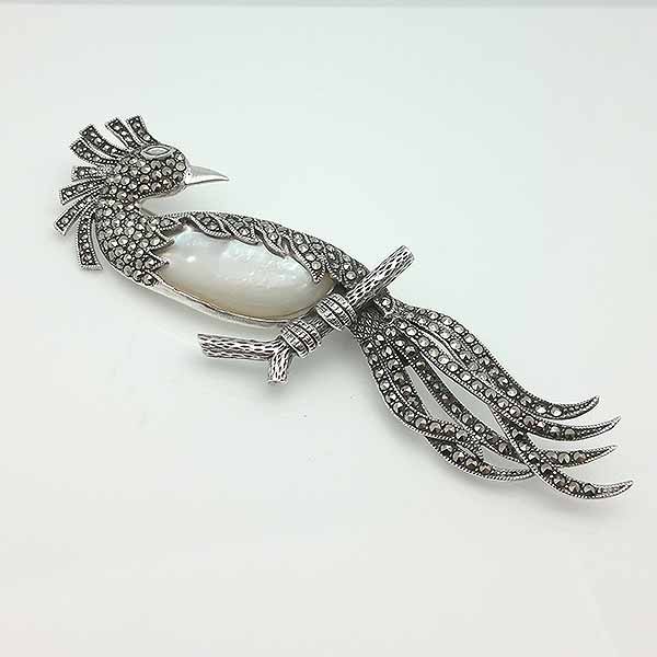 Bird brooch in silver