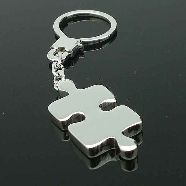 Keychain with shaped puzzle piece