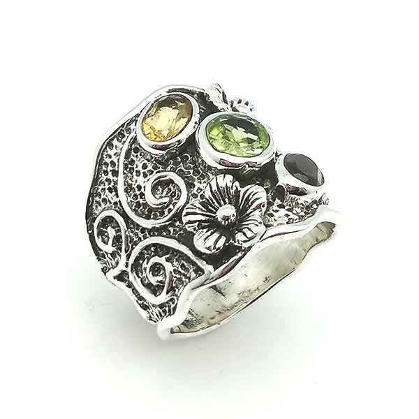 Silver ring with flowers