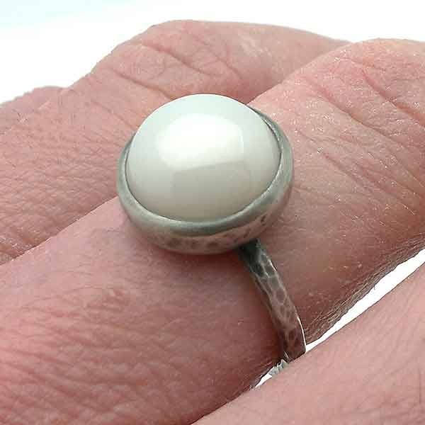 Ring silver, opaque zirconia.