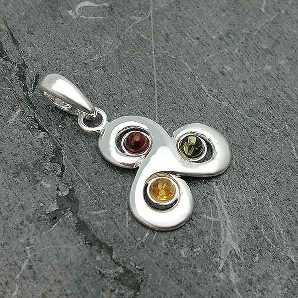Silver and amber trisquel