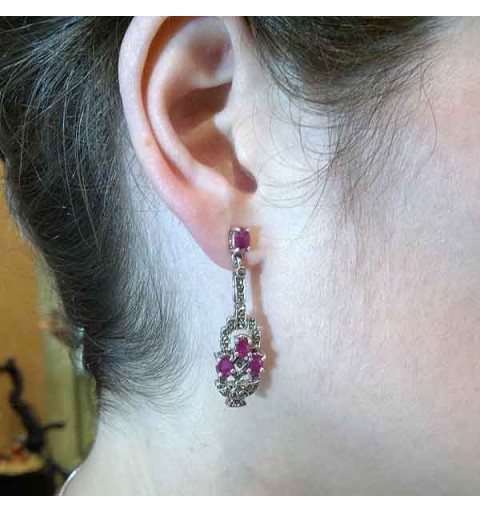 Silver earrings and rubies