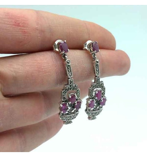 Silver earrings and rubies