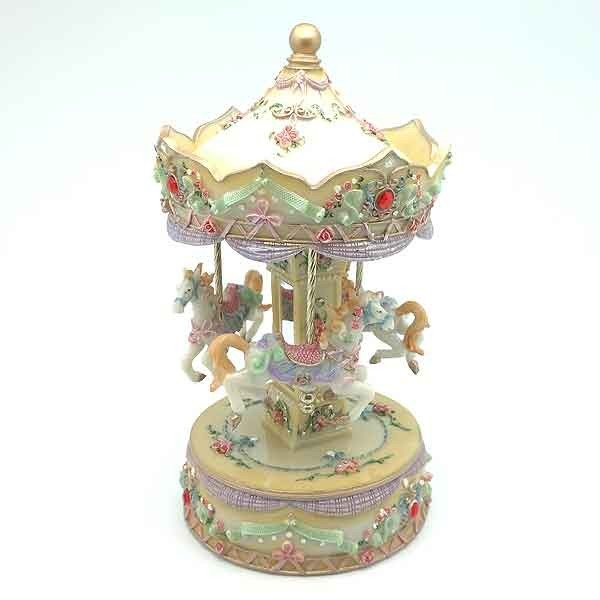 Carrusel musical amarillo