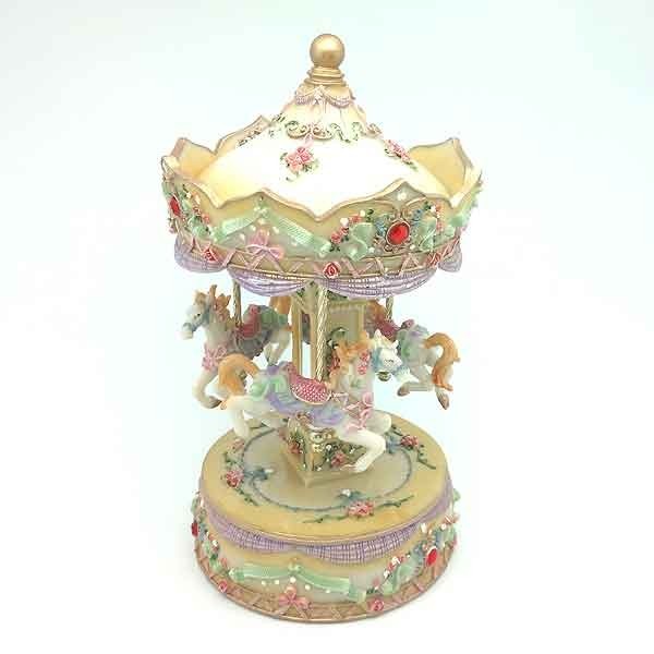 Carrusel musical amarillo