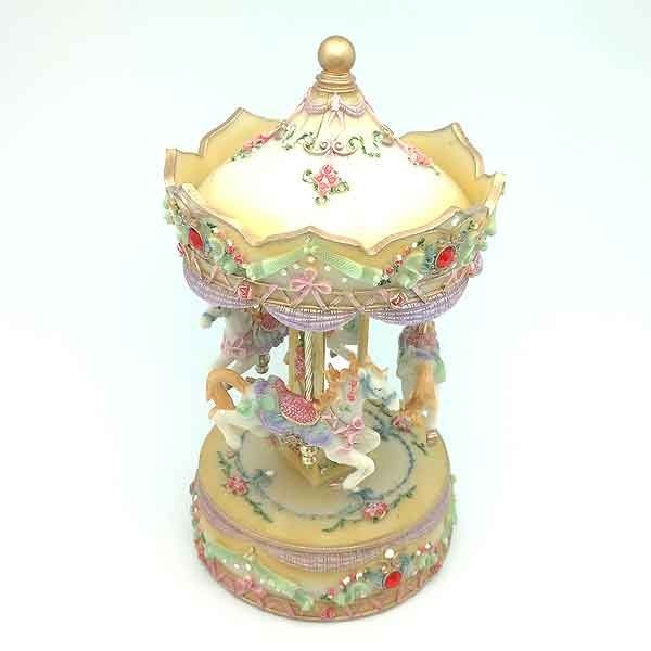 Carrusel musical amarillo