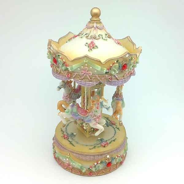 Carrusel musical amarillo