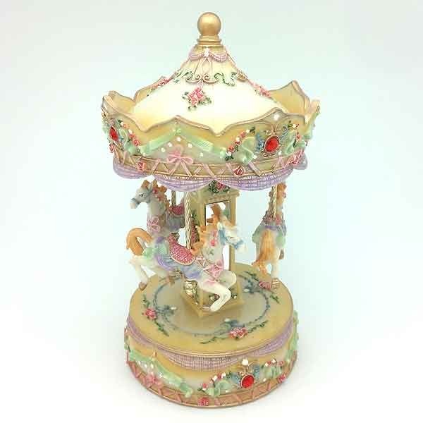 Carrusel musical amarillo