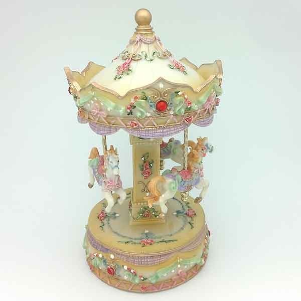 Carrusel musical amarillo