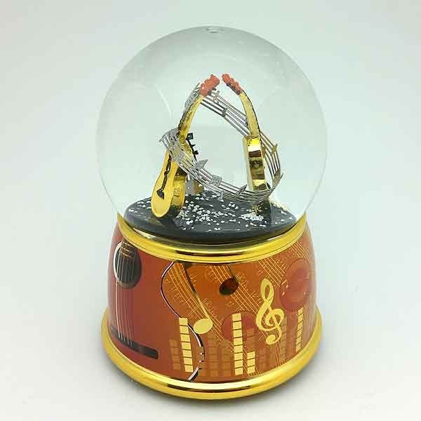 Snow globe with guitars