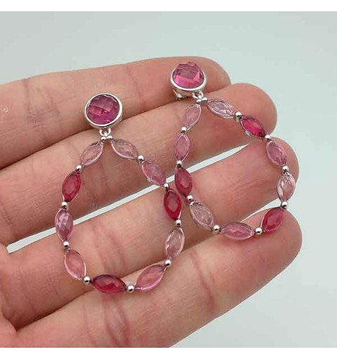 Long earrings in sterling silver with pink tones.