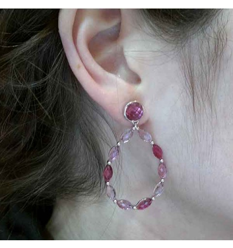 Long earrings in sterling silver with pink tones.