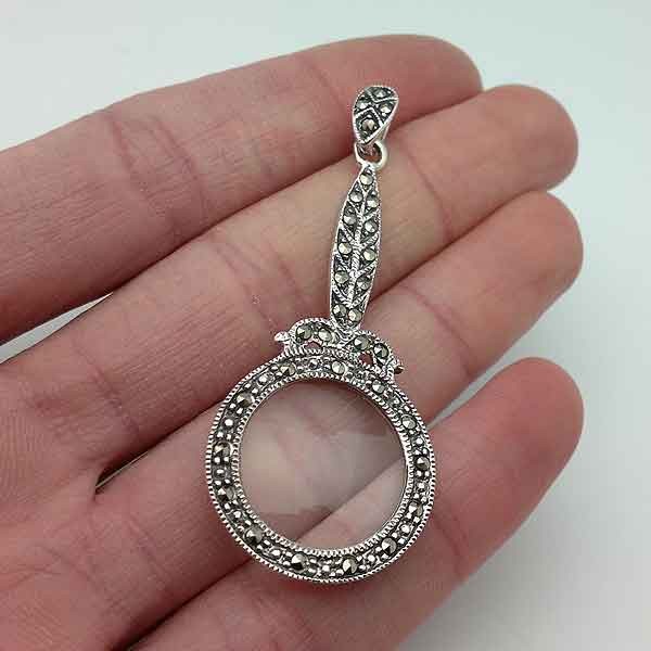 Pendant with magnifying glass and marcasites