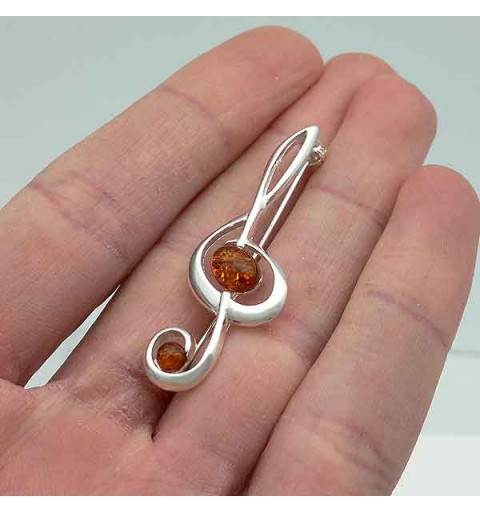 Broche ambar clave de sol