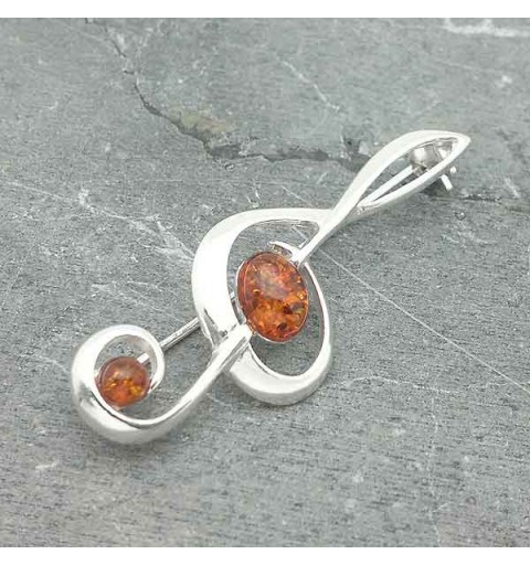 Broche ambar clave de sol