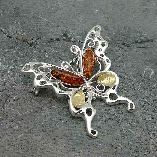 Butterfly amber brooch