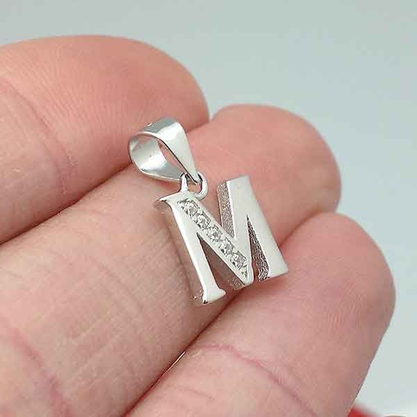 Initial pendant, letter M.