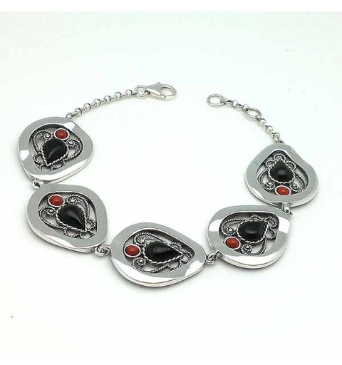 Bracelet articulated in silver, jet and coral.