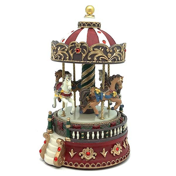 Musical carousel in red and green tones.