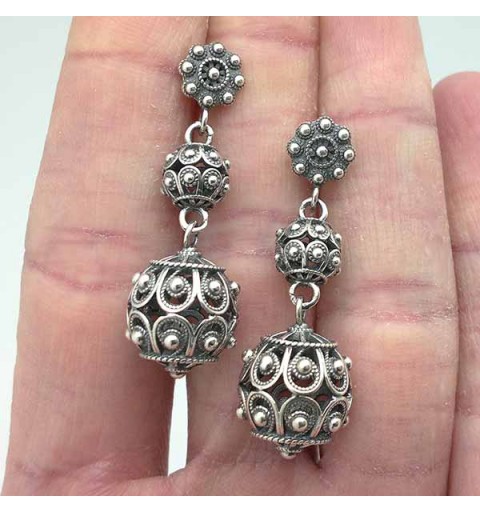 Long earrings, charro style, in sterling silver.