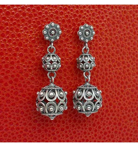 Long earrings, charro style, in sterling silver.