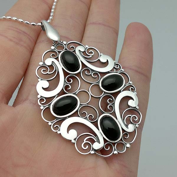 Pendant, silver and jet, chain included.