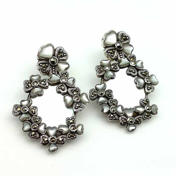 Earrings adorned with flowers, made of sterling silver, mother-of-pearl and marcasites.