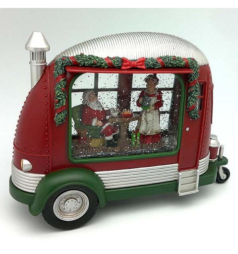 Christmas lantern, shaped like a caravan, in which we can see Santa Claus having dinner on Christmas Eve.