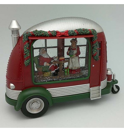 Christmas lantern, shaped like a caravan, in which we can see Santa Claus having dinner on Christmas Eve.