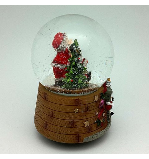 Bola de nieve musical, con papá Noel y árbol navideño.