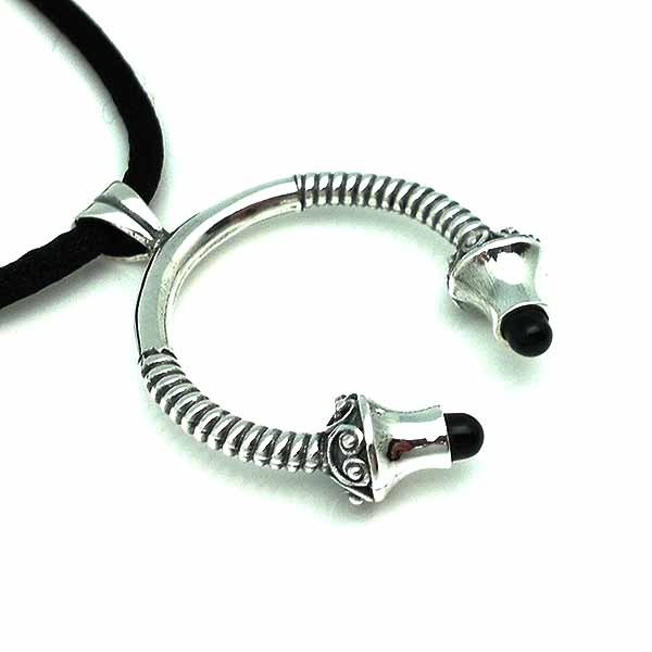 Torque-shaped pendant in sterling silver and jet.
