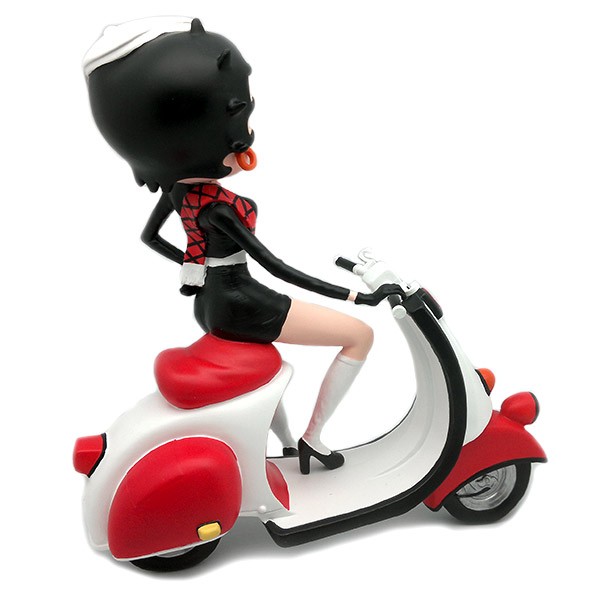 Betty Boop sitting on her pretty Scooter.