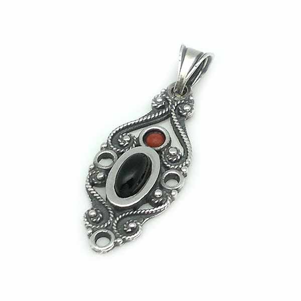 Classic pendant, made of sterling silver, jet and coral.