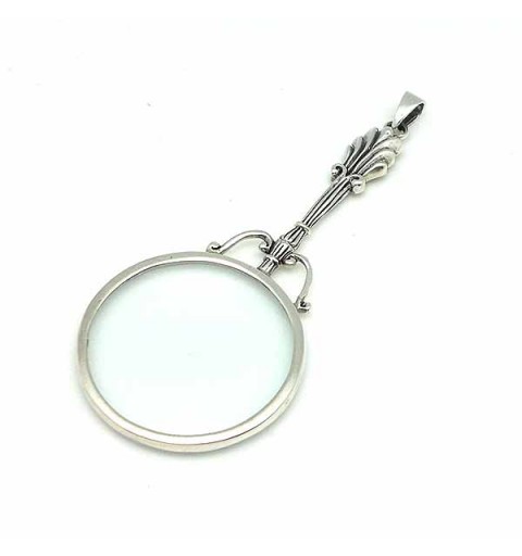 Pendant in sterling silver, shaped like a magnifying glass.