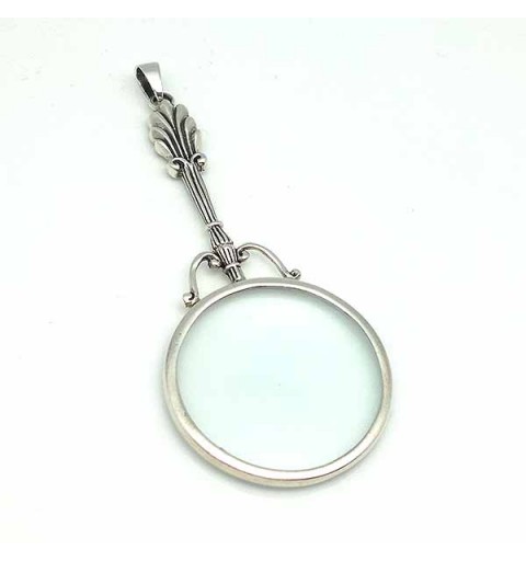 Pendant in sterling silver, shaped like a magnifying glass.