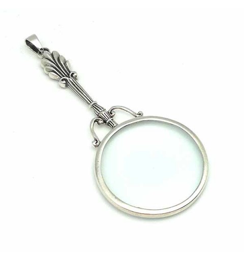 Pendant in sterling silver, shaped like a magnifying glass.