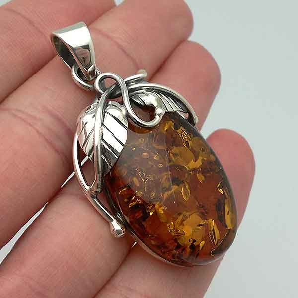 Pendant made of sterling silver and a beautiful natural amber.