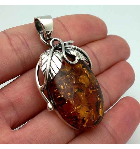 Pendant made of sterling silver and a beautiful natural amber.