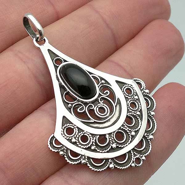 Handmade pendant, in sterling silver and jet.
