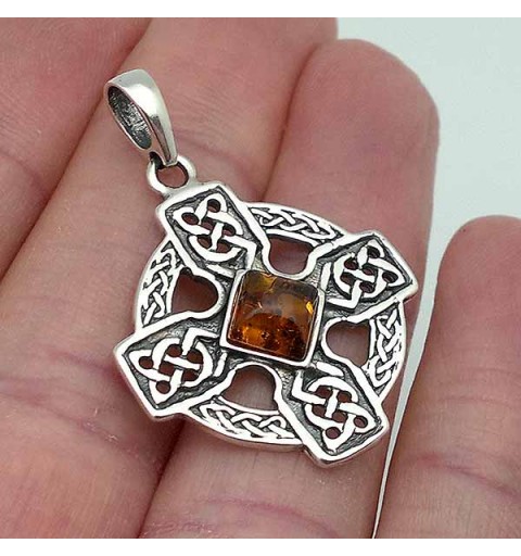 Celtic cross, in sterling silver and amber.