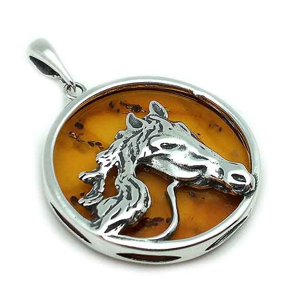 Horse pendant, in sterling silver and amber.