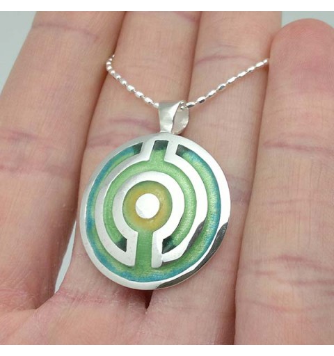 Celtic pendant, in the shape of a labyrinth, made of sterling silver and fire enamel.