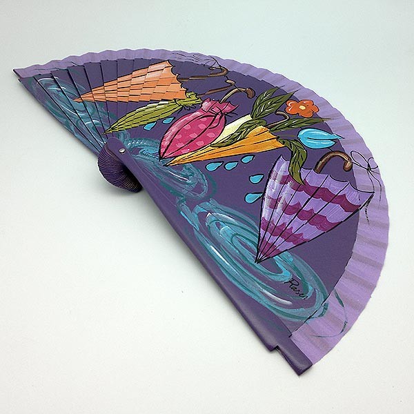 Hand-painted fan, in which we can see several umbrellas with different colors.