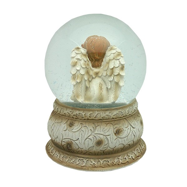 Bola de nieve con querubín.