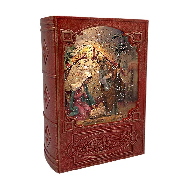 Christmas music box, in the shape of a book, in which we see the birth of Jesus.