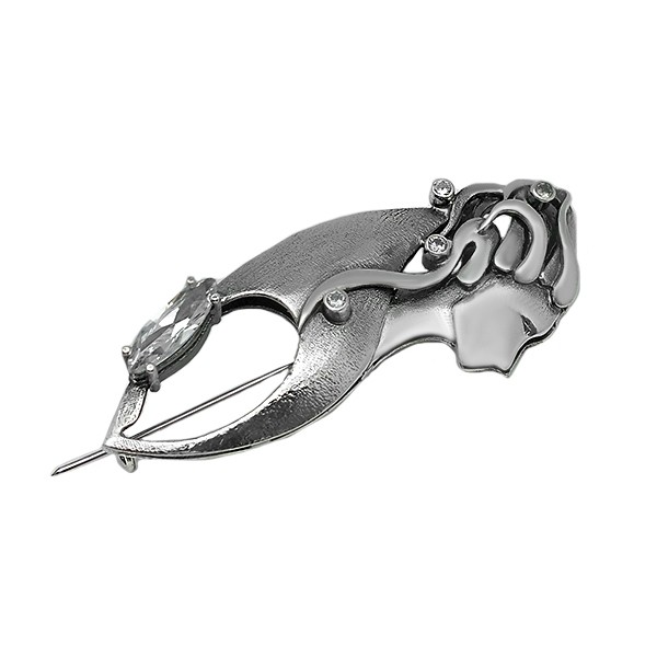 Brooch with the silhouette of a woman made of sterling silver.