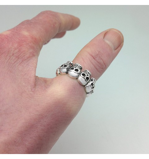 Ring with six skulls, made of sterling silver.