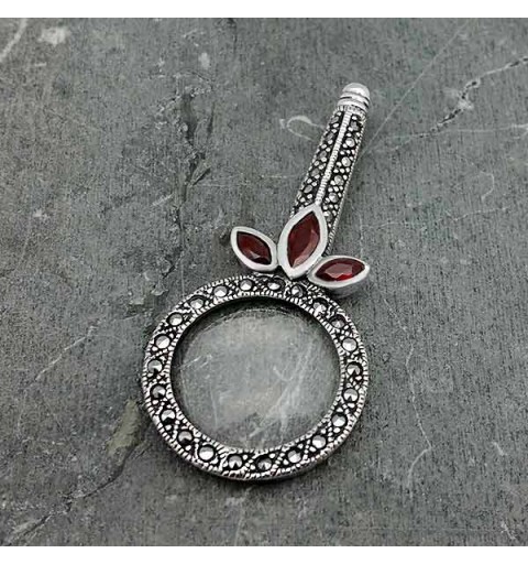 Colgante lupa con granates