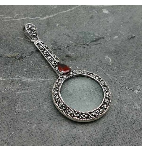 Magnifying glass and marcasite pendant