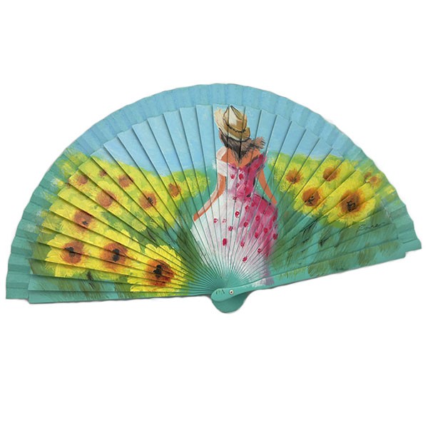 "Hand-painted fan featuring a woman in a sunflower field."